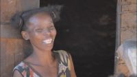 Liva smiles outside her home in Ankilimalinike, Madagascar 